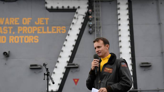 Navy Captain Removed from Carrier Tests Positive for COVID-19