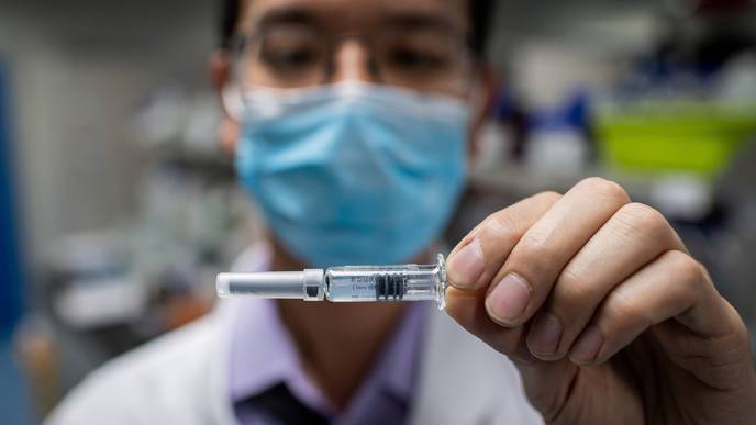 COVID-19 Vaccine Researchers Left in the Dark as Trials Remain on Hold